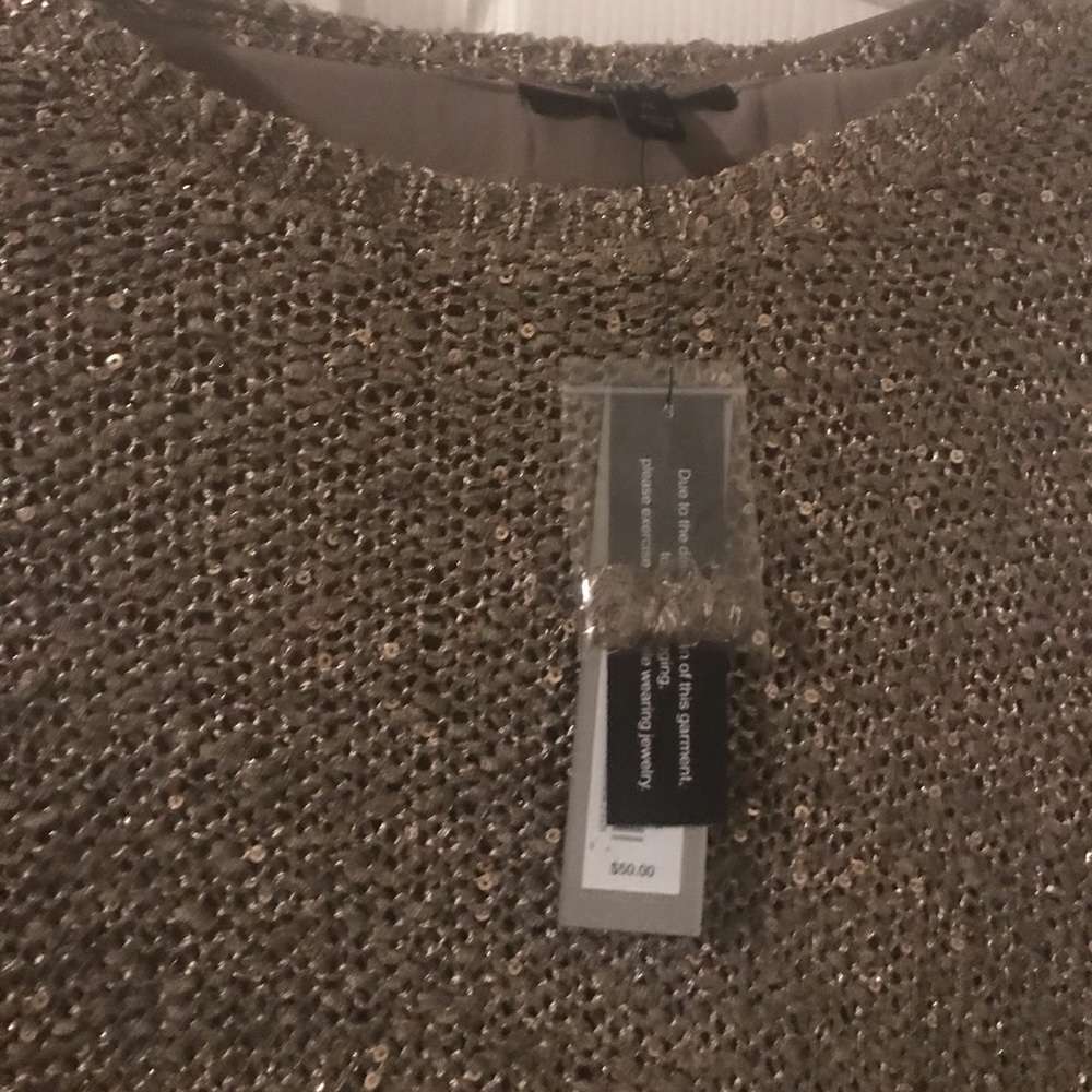 Beautiful gold shimmery asymmetrical sweater